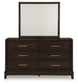 Neymorton California King Upholstered Panel Bed with Mirrored Dresser and Chest